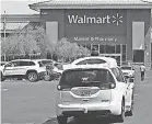  ?? WALMART ?? Driverless cars, like this Waymo vehicle, may be the future for grocery delivery.