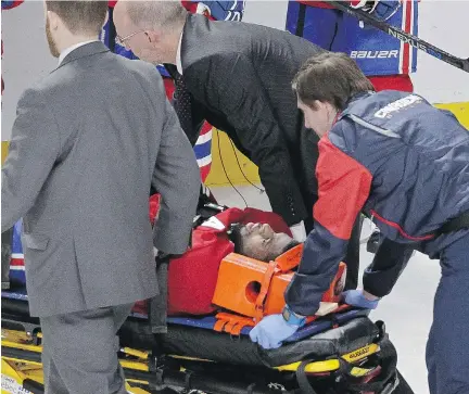  ?? J O H N K E N N E Y ?? P. K. Subban is taken off the ice on a stretcher after suffering an injury against the Buffalo Sabres at the Bell Centre on Thursday.