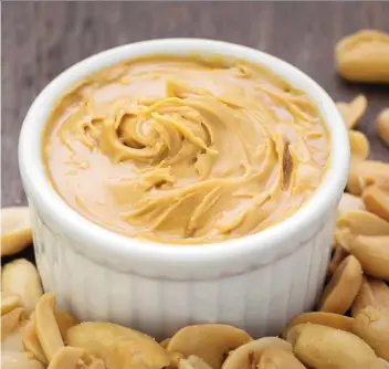  ?? IMAGES/ISTOCKPHOT­O
GETTY ?? When buying all-natural peanut butter, mix the separated oil into the peanut butter and store it in the fridge.