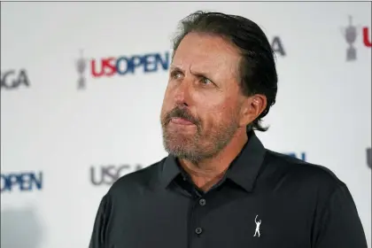  ?? ROBERT F. BUKATY — THE ASSOCIATED PRESS ?? Phil Mickelson ponders a question at a press conference Monday at The Country Club in Brookline, Mass., ahead of the U.S. Open.