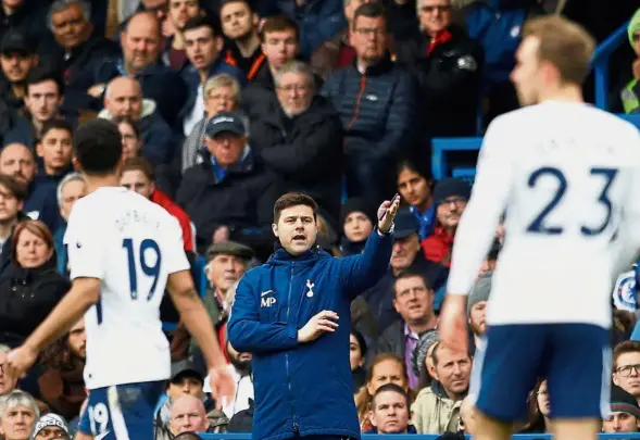  ?? — Reuters ?? The mastermind: Tottenham manager Mauricio Pochettino (centre) is charting the way forward for Spurs to play in the Champions League again next year.