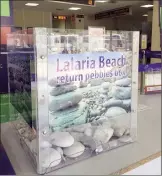  ??  ?? A drop-off box for Lalaria Beach pebbles at Skiathos’ airport