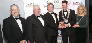  ??  ?? Pictured at the 2018 LAMA All Ireland Community & Council Awards at Croke Park, Dublin are Andrew Rennie, Kingspan; Councillor PJ Reilly, LAMA representa­tive from Longford County Council; Barry Woods, Executive Engineer, Louth County Council; Colm...