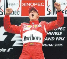  ?? FOTO: DPA ?? Typische Jubelpose: Michael Schumacher nach einem Sieg 2006.