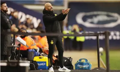  ?? ?? Leicester City manager Enzo Maresca suffers as his team draw a blank at The Den. Photograph: Plumb Images/Leicester City FC/Getty Images