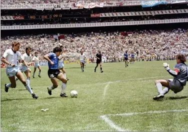  ?? Picture: Getty ?? Argentina’s Diego Maradona on his way to scoring his second goal during the 1986 World Cup quarter-final