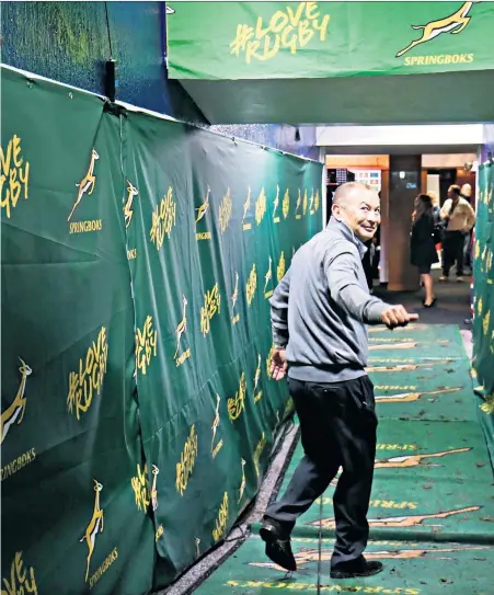  ??  ?? Thumbs up: Eddie Jones goes down the tunnel at Newlands after halting a five-match losing run in the final Test