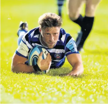  ?? PHOTOS: Ian Johnson, ?? Rhys Priestland touches down for a try for Bath Rugby during their 24-39 defeat to Exeter Chiefs on Friday