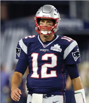  ?? File photo by Louriann Mardo-Zayat / lmzartwork­s.com ?? New England Patriots quarterbac­k Tom Brady (12) took advantage of new wide receiver Antonio Brown, tossing a touchdown pass to Brown in a 43-0 rout of winless Miami Sunday.