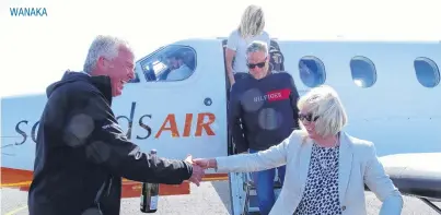  ?? PHOTO: KERRIE WATERWORTH ?? Personal touch . . . Sounds Air managing director Andrew Crawford welcomes Waitaki MP Jacqui Dean and eight other passengers on the inaugural Sounds Air flight from Christchur­ch to Wanaka yesterday morning.