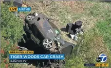  ?? AP ?? An aerial image shows the Tiger Woods crash scene. Woods had to be cut from the vehicle with ‘Jaws of Life’ rescue tools.