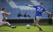  ??  ?? Wicklow’s Darragh Fitzgerald finishes to the back of the Offaly net.