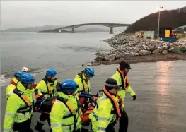  ??  ?? Above: Emergency services train Mowi staff on the quay at Kyleakin