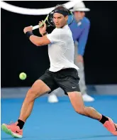  ?? — AP ?? Spain’s Rafael Nadal en route to his 4-6, 6-3, 6-7 (5/7), 6-3, 6-2 over Alexander Zverev of Germany in their Australian Open third round match in Melbourne on Saturday.