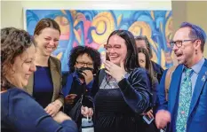  ?? EDDIE MOORE/JOURNAL ?? From left, Nayomi Valdez and Lena Weber Salazar, both with the ACLU; Kayla Herring, Planned Parenthood of the Rocky Mountains; and Marshall Martinez, Equality New Mexico, celebrate the passage of SB13 on Friday.