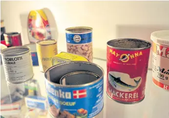  ??  ?? PRECIOUS MEMORIES: Clothes, cuddly toys and empty food tins are among the items on display at Sarajevo’s War Childhood Museum, which emphasises the resistance of children.