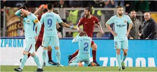  ?? AP ?? Roma’s Daniele De Rossi (second right) celebrates after Kostas Manolas scored his side’s third goal against during the Champions League quarterfin­al. —