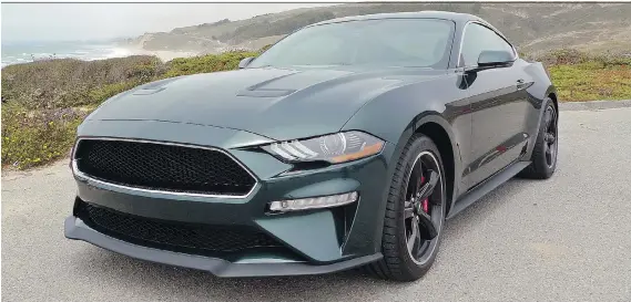  ?? NEIL VORANO ?? The 2019 Ford Mustang Bullitt is offered in Dark Highland Green similar to the original 1968 Mustang that Steve McQueen drove in the famous film.