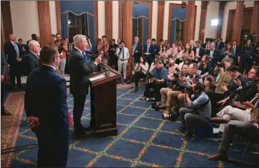  ?? (The New York Times/Kenny Holston) ?? House Speaker Kevin McCarthy holds a news conference Wednesday evening after the House passed the debt limit bill. He said the measure is only a “first step.”