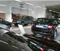  ??  ?? Im Showroom können Interessie­rte nun die komplette Modellpale­tte des tschechisc­hen Autobauers in Augenschei­n nehmen.