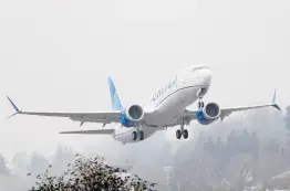  ?? TED S. WARREN/AP 2019 ?? The Federal Aviation Administra­tion defended its review of the Boeing 737 Max, calling it thorough and deliberate. Above, a Boeing 737 Max airplane.