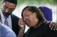  ?? GERALD HERBERT — THE ASSOCIATED PRESS ?? Kimberly Pierson, mother of Alton Sterling’s son Na’Quincy Pierson, cries as she speaks to reporters following a meeting with the U.S. Justice Department at federal court in Baton Rouge, La., Wednesday.