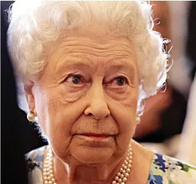  ??  ?? Polite interest: The Queen during the discussion at Buckingham Palace