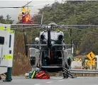  ??  ?? Emergency services at the scene of Saturday’s bus crash on the road to Tu¯ roa skifield.