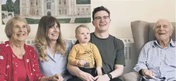  ??  ?? Bert with four generation­s of his family: Daughter Pat, grandaught­er Janine, great-grandson Michael and greatgreat-grandson Codi