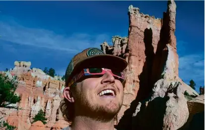  ?? RICK BOWMER/ASSOCIATED PRESS ?? Visitors to Utah’s Bryce Canyon were among those seeing the “ring of fire” eclipse Saturday.