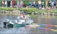  ?? CHRIS SHANNON/CAPE BRETON POST ?? Close to 1,000 yellow, blue and pink rubber ducks are dumped into Renwick Brook in Glace Bay at the start of the annual duck race as part of Bay Days festivitie­s Saturday.