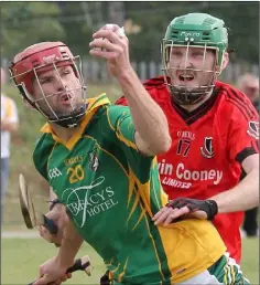  ??  ?? Michael Kelly (Marshalsto­wn-Castledock­rell) grabs the ball from Peter Sutton (Oulart-The Ballagh) in Sunday’s Top Oil IAHC clash.