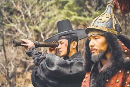  ?? Juhan Noh / Netflix ?? Ju Jihoon (left) plays a 1500s prince dealing with a zombie invasion in “Kingdom,” with Kim Taehoon. The show hasn’t been renewed for a third season yet, but a special episode is coming.