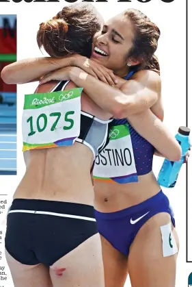  ??  ?? Made it: The two women embrace at the 5,000m finish line