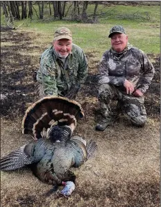  ?? Joe Volpe of Little Rock (left) killed this big Rio Grande gobbler in Oklahoma on
April 9. (Photo submitted by Joe Volpe) ??