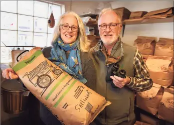  ?? Brian A. Pounds / Hearst Connecticu­t Media ?? Janet and Jerry Connolly have seen a huge increase during the pandemic in seed sales, and all things birding, at their store, The Audubon Shop, in Madison.