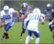  ?? TANIA BARRICKLO - DAILY FREEMAN ?? Saugerties quarterbac­k Matt Bucci advances the ball during Saturday’s Mum Bowl against Monticello.