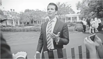  ?? SHAWN THEW, EUROPEAN PRESSPHOTO AGENCY ?? Donald Trump Jr. talks to reporters during the White House Easter Egg Roll on April 17, 2017.