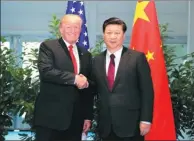  ?? YAO DAWEI / XINHUA ?? President Xi Jinping with US President Donald Trump on Saturday in Hamburg, Germany