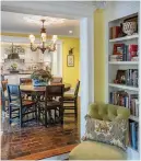  ?? Tribune News Service ?? Built-in bookcases in the dining area, which links the kitchen to the family room, help transition from one space to the next.