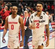  ??  ?? Rodney Chatman (left), with Ibi Watson, made an immediate impact starting all 31 games this past season and is considered one of the country’s best defensive guards.