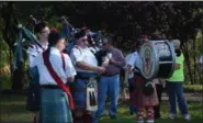  ??  ?? Hamilton Celtic Pipe and Drums performs “Amazing Grace” during a ceremony honoring veterans Saturday in Memorial Park in Pottstown.