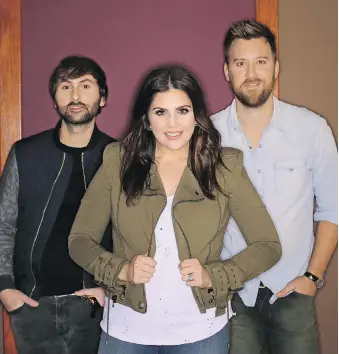  ?? MARK HUMPHREY/THE ASSOCIATED PRESS ?? Lady Antebellum is Dave Haywood, Hillary Scott, and Charles Kelley.