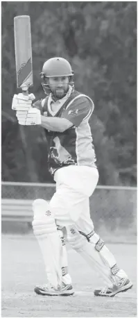  ??  ?? Above: Paul Timewell works the ball to the leg side during the division two match against Jindivick