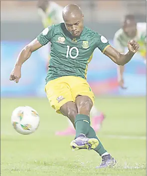  ?? (Pic: BackpagePi­x) ?? Bafana Bafana star player Percy Tau takes a penalty during the 2023 Africa Cup of Nations match against Mali at Amadou Gon Coulibaly Stadium in Korhogo.