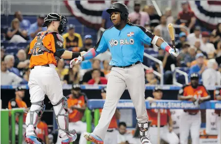  ?? LYNNE SLADKY/THE ASSOCIATED PRESS ?? Toronto Blue Jays prospect Vladimir Guerrero Jr. got a chance to strut his stuff Sunday in the MLB All-Star Futures Game at Marlins Park in Miami.