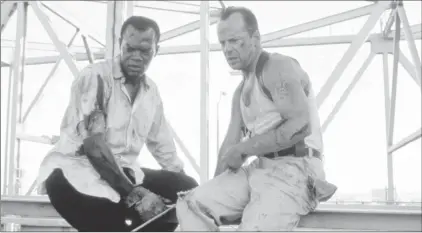  ??  ?? Samuel L. Jackson and Bruce Willis as seen in “Die Hard With a Vengeance”