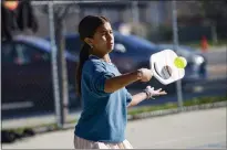  ?? ?? Olivia Pena, 13, plays pickleball in Morgan Hill on Friday. Pena has been playing for four years with her brother, Tiger Pena, 11, and hopes to be a profession­al pickleball­er one day, she says.