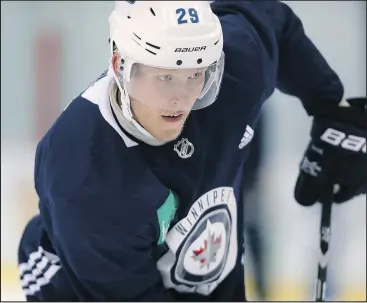  ?? POSTMEDIA FILES ?? Jets’ Patrik Laine has just one goal and one assist in four games this season.