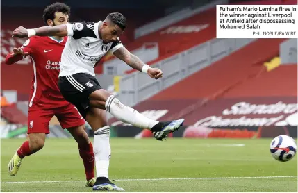  ?? PHIL NOBLE/PA WIRE ?? Fulham’s Mario Lemina fires in the winner against Liverpool at Anfield after dispossess­ing Mohamed Salah